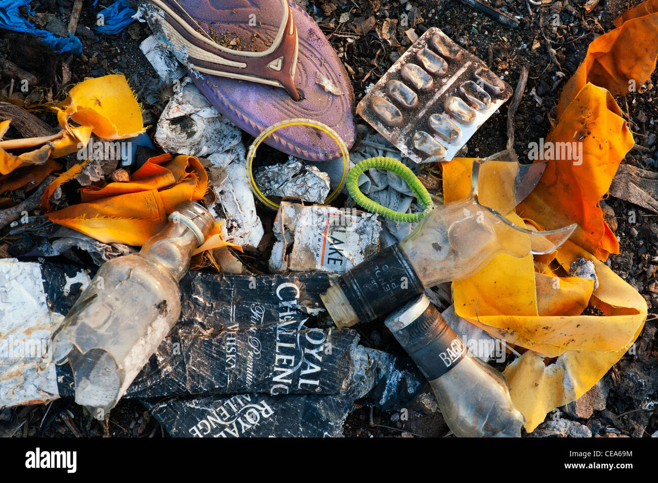 Discarded household waste in the Indian countryside, representing the concept of Indian family social issues. Andhra Pradesh, India Stock Photo