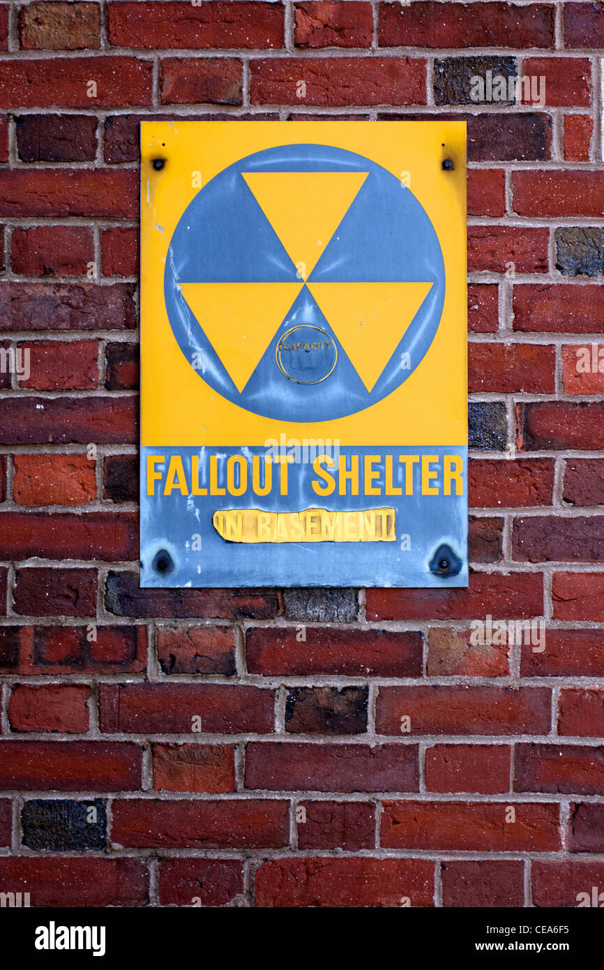 A weathered sign announcing a fallout shelter on an abandoned building on the Eastern seaboard of the USA. Stock Photo