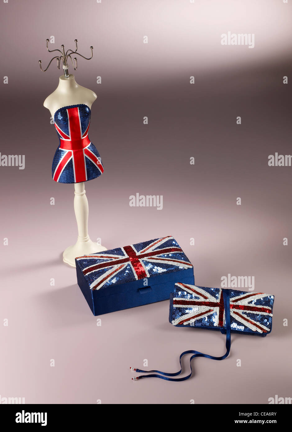 A still life shot of two union flag jewelry boxes and a jewelry stand