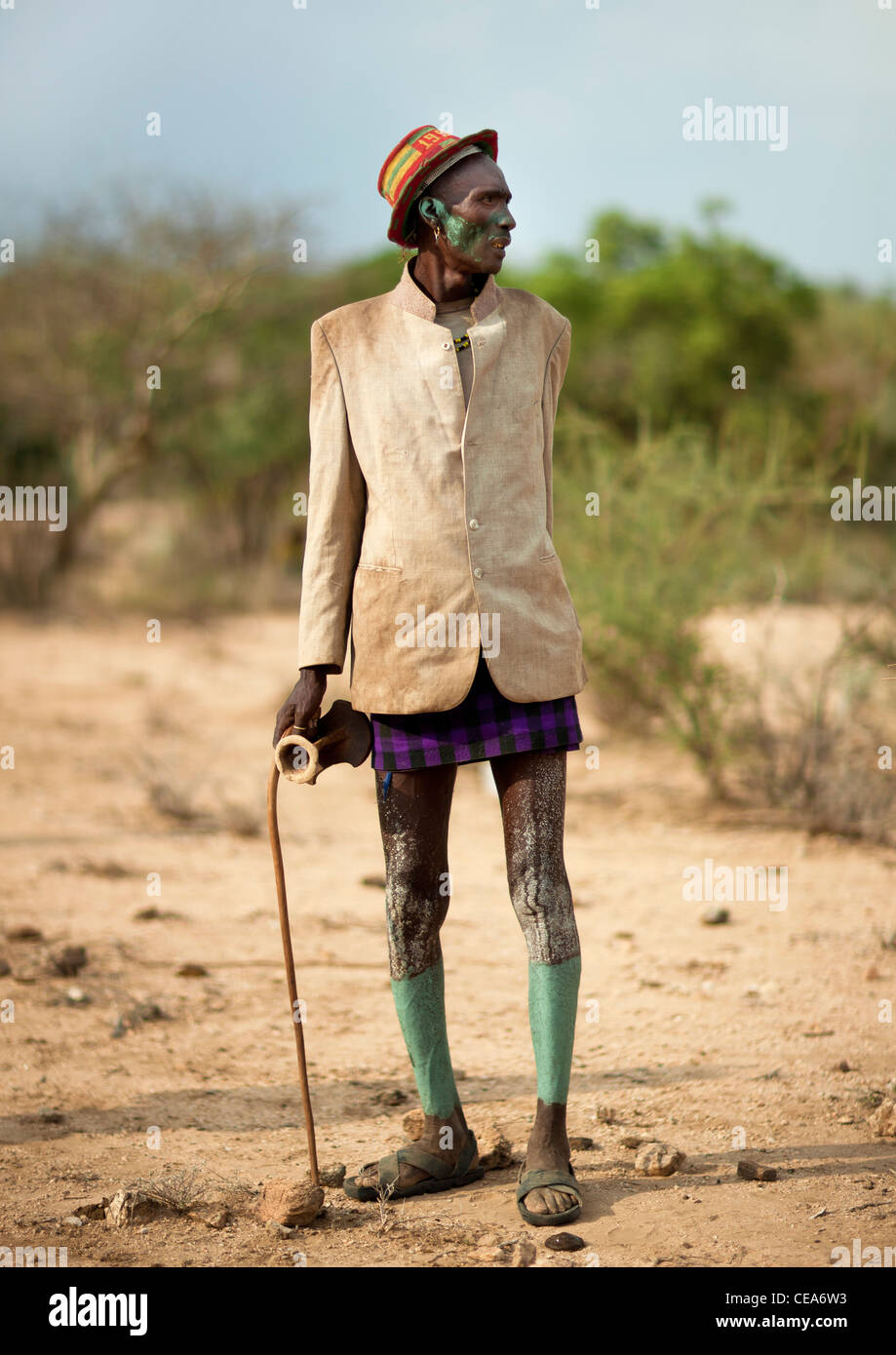 Hamer Man With Ceremony Costume Wooden Stick And Headrest In His Hand Omo Valley Ethiopia Stock Photo