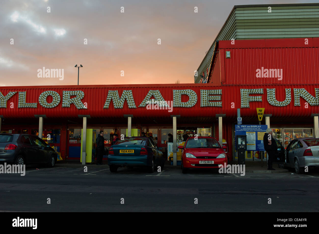Cleethorpes seafront amusements section at sunset on this North East