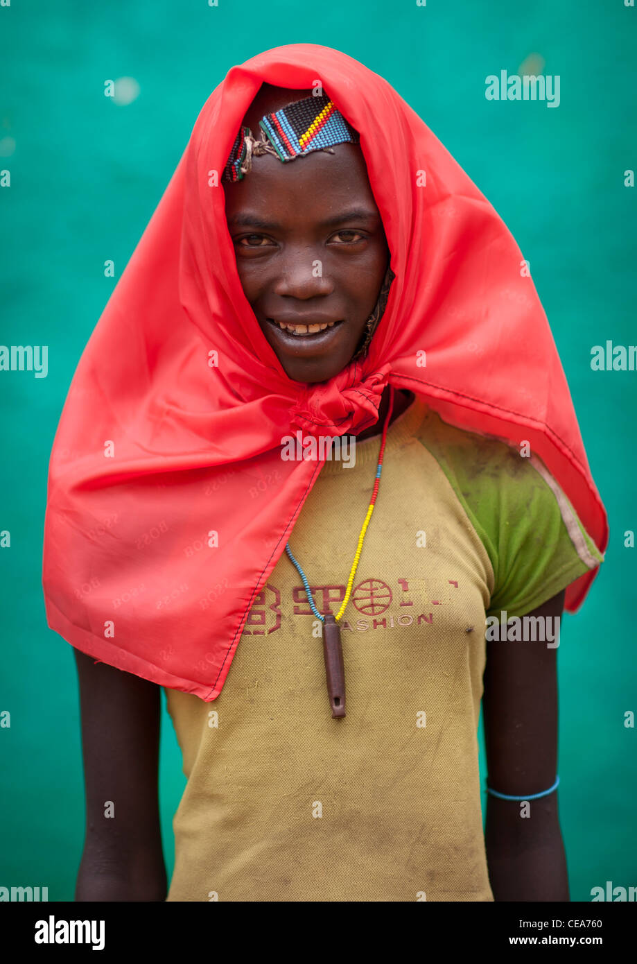 Banna Teenage Girl With Whistle And Flushing Red Headscarf Portrait Omo Valley Ethiopia Stock Photo
