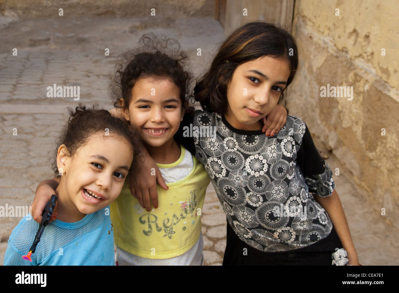 Three cheeky girls hanging out in the tannery are of the Medin in Fez, Morocco Stock Photo