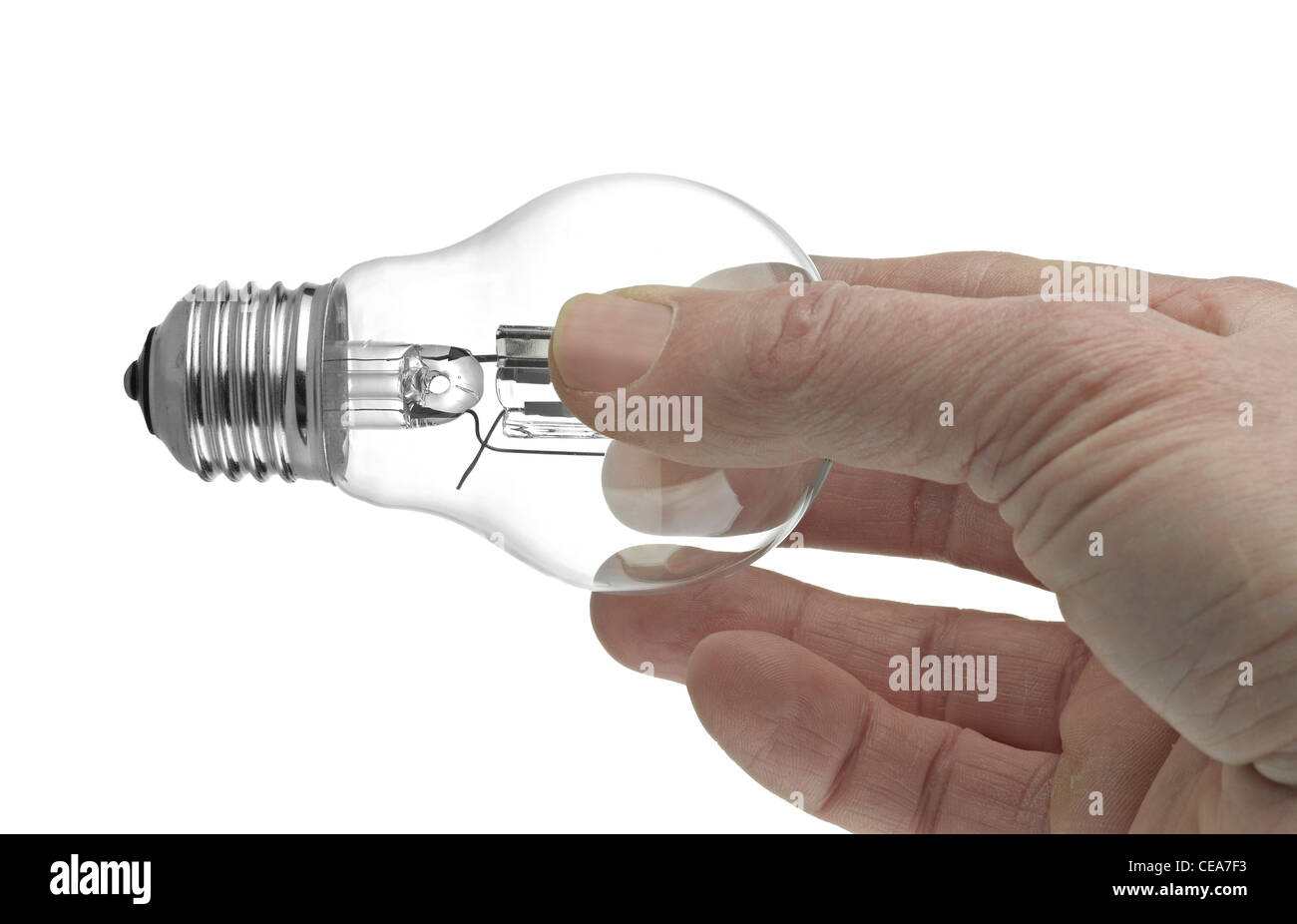 Lightbulb in a hand isolated on white background Stock Photo - Alamy