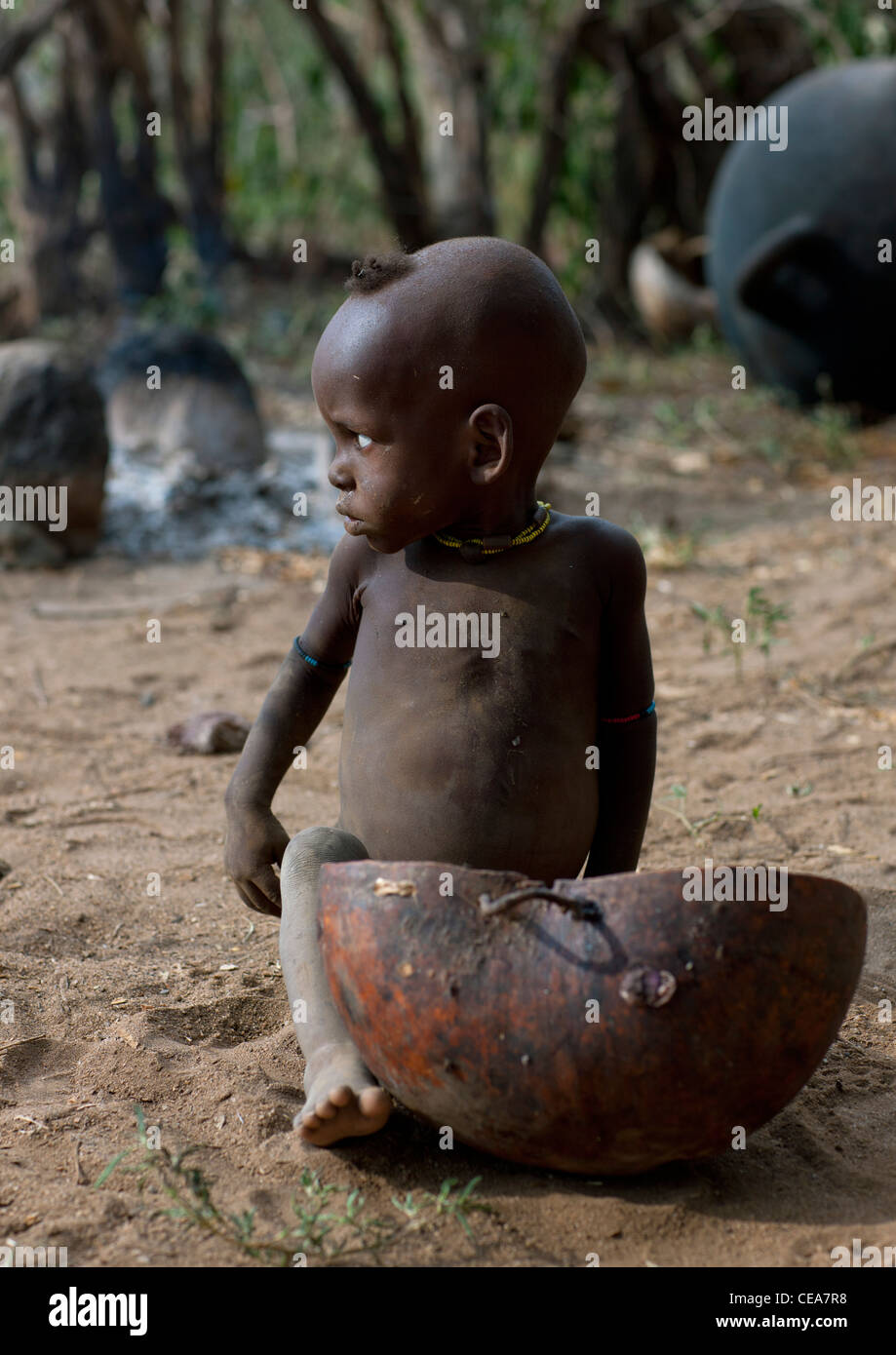 African baby boy sitting on floor hi-res stock photography and images ...