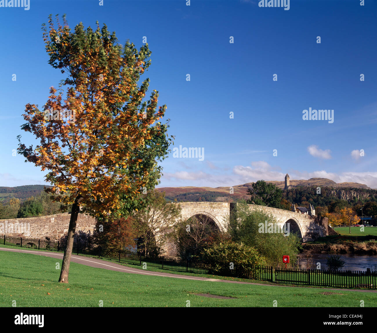 Stirling Bridge (Auld Brig), City of Stirling, Scotland, UK. The Wallace Monument is in the background. Stock Photo