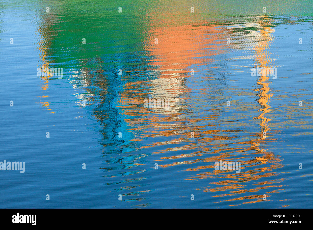 Reflections of a ship loading at Blythe Quay make for a brightly colored abstract Stock Photo