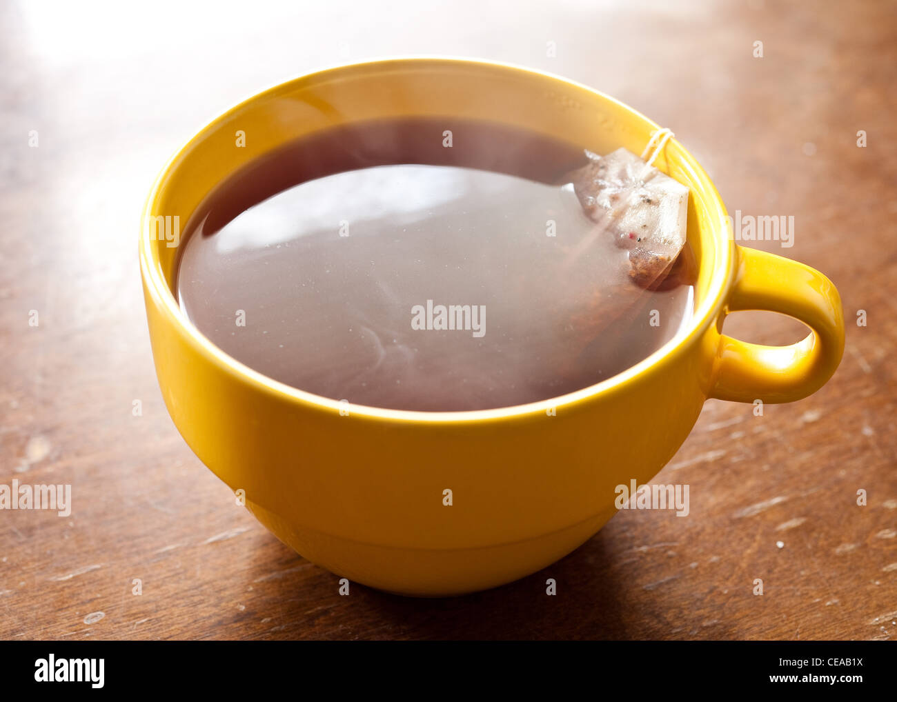 A cup of tea sitting on a table Stock Photo