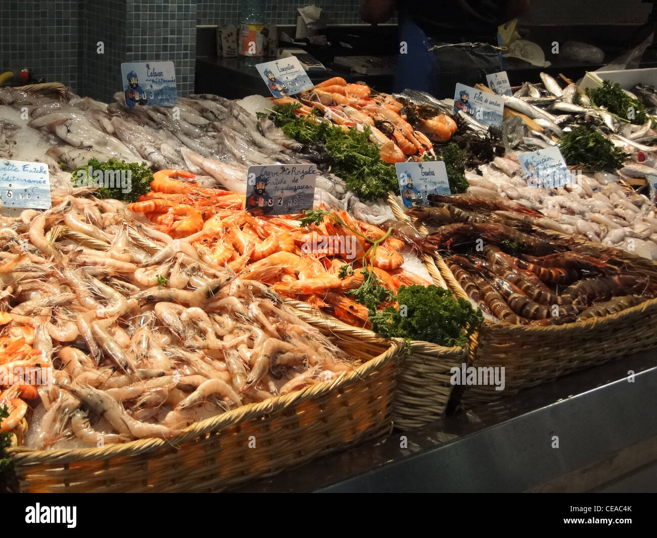 Fresh shrimp and calamari  in the market of  Les Halles, Avignon, France Stock Photo