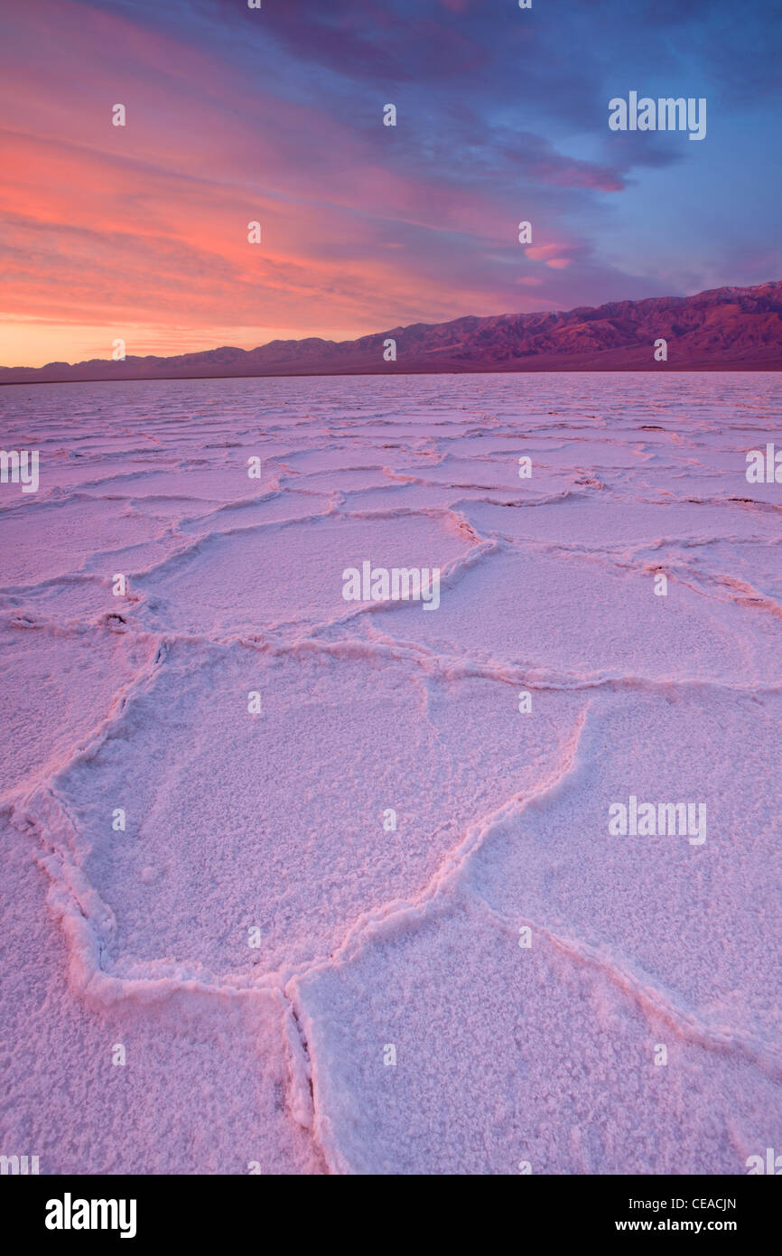 Sunrise over salt polygons and patterns at Badwater Salt Flats in Death Valley National Park, California, USA Stock Photo