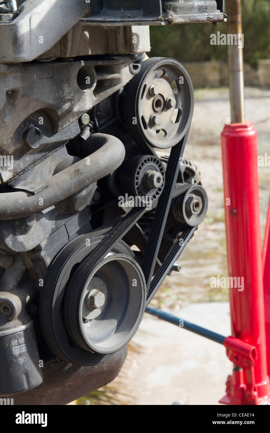 mechanical Car engine pulleys detail Stock Photo Alamy