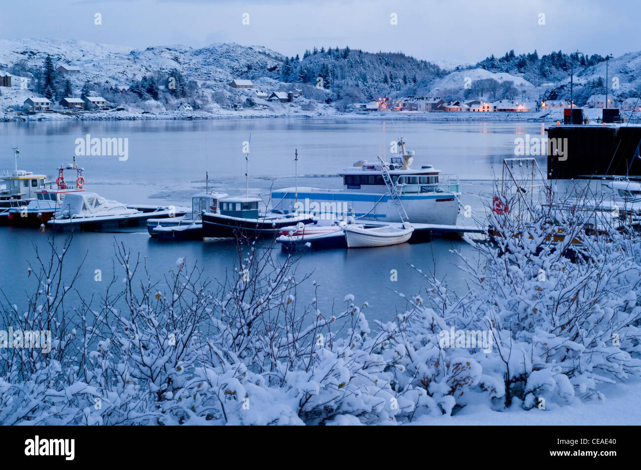 Lochinver harbour snowfall twilight hires stock photography and images
