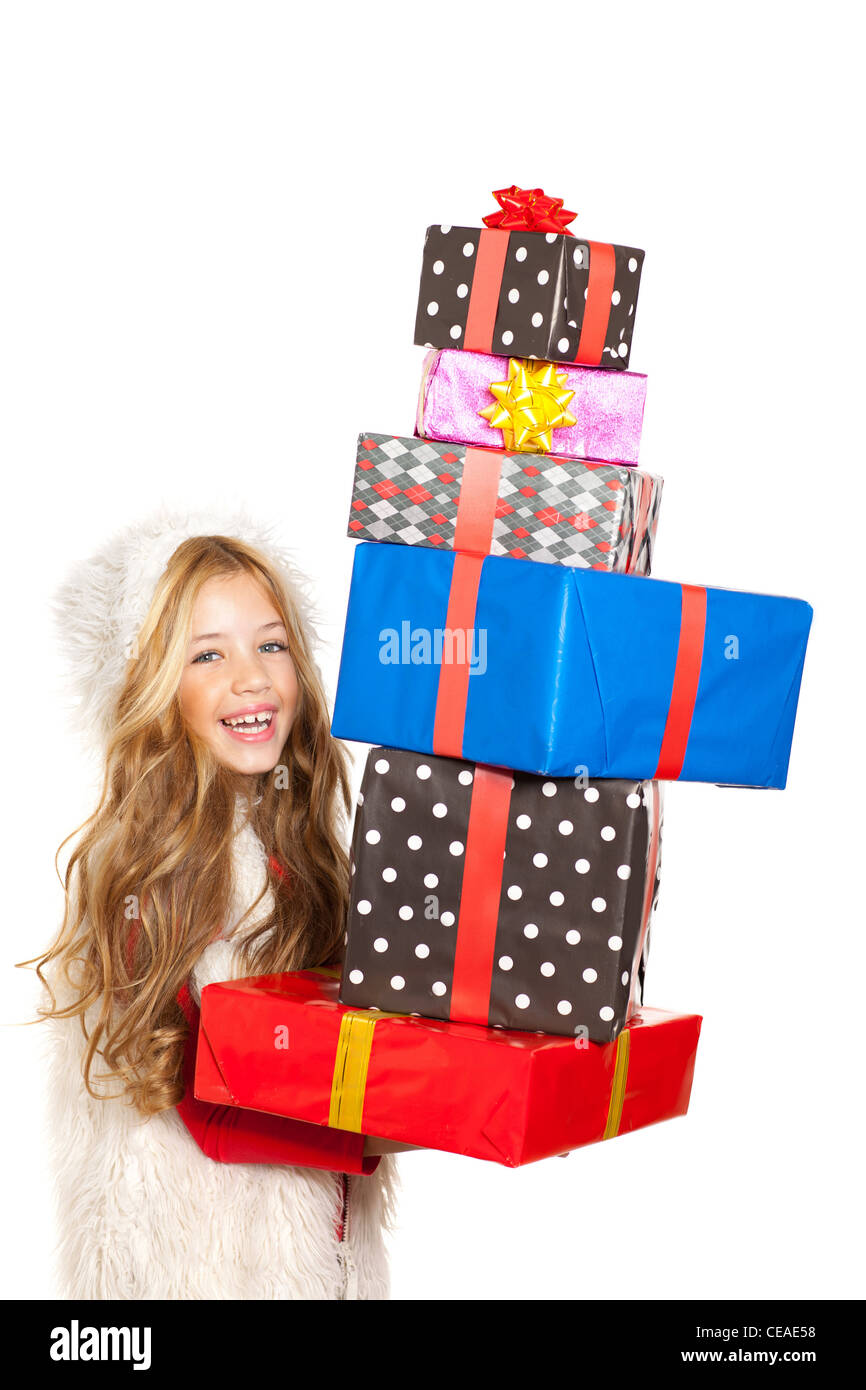 little girl holding gifts in christmas Stock Photo - Alamy
