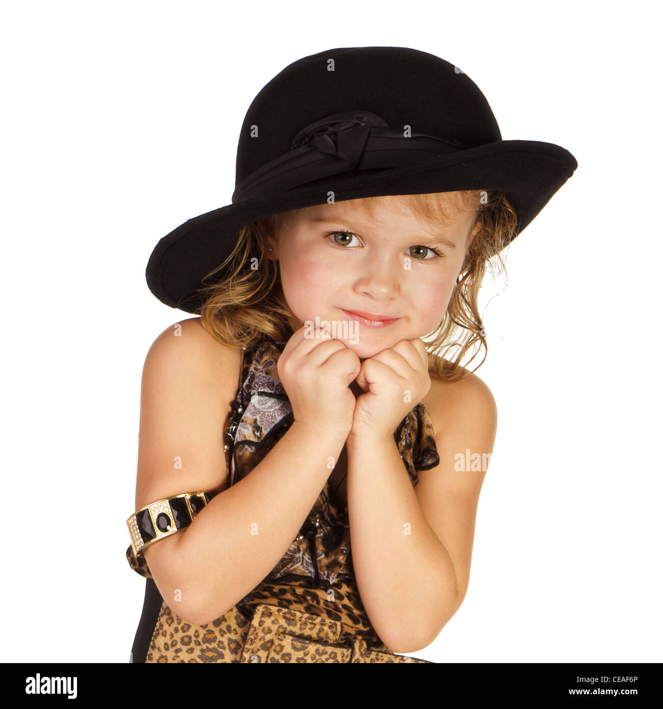 Beautiful little girl in a hat over white background Stock Photo - Alamy
