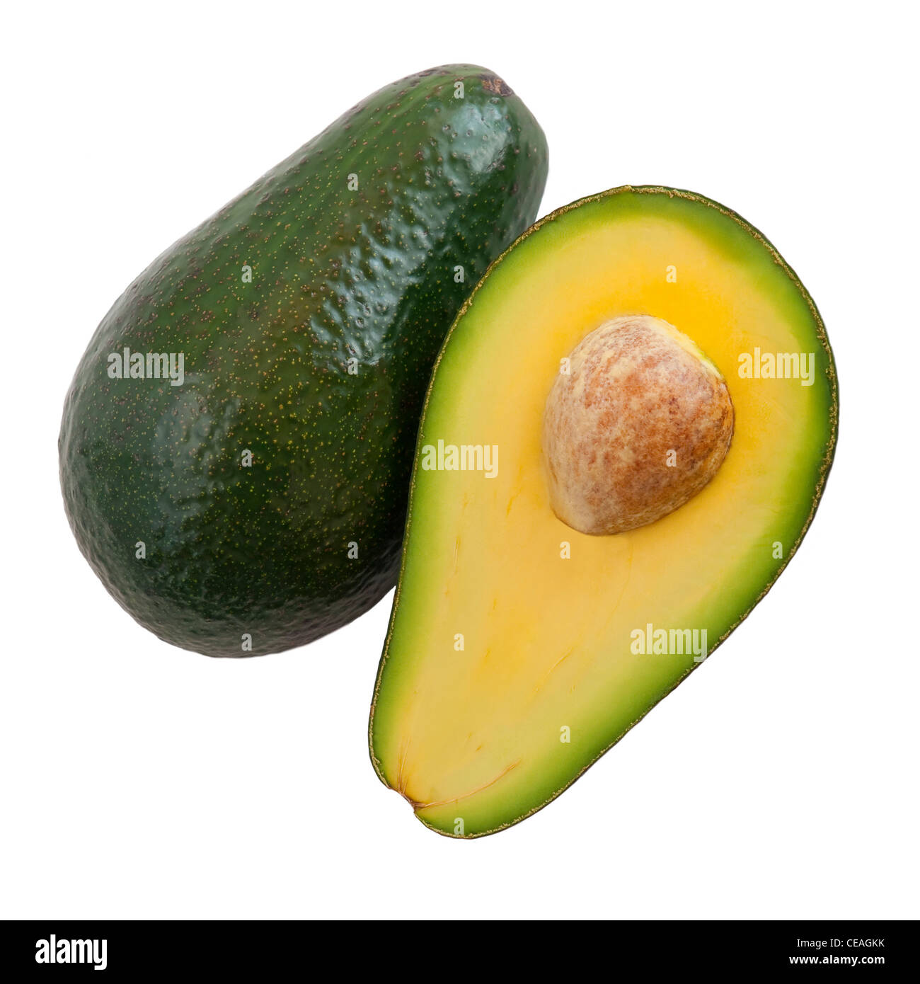 Split avocado pieces viewed from above. Stock Photo