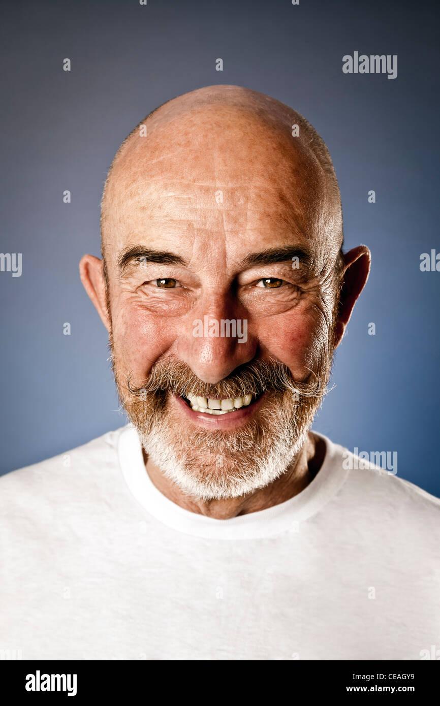 An old man with a gray beard Stock Photo