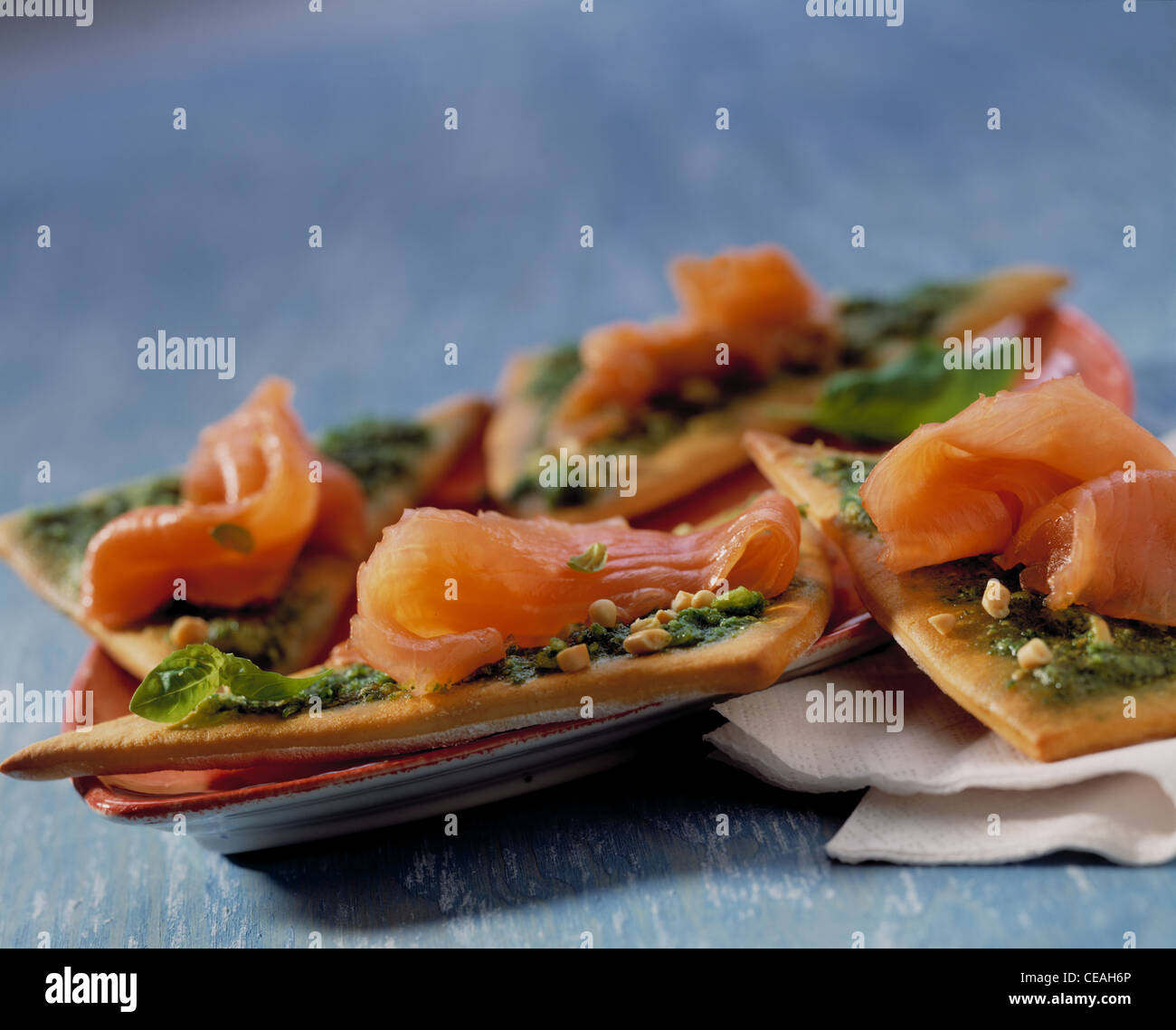 Pesto - triangles with smoked salmon Stock Photo