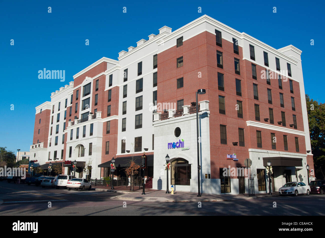 Hampton Inn & Suites hotel, downtown, Gainesville, Florida, USA, building, architecture, palm tree, blue sky Stock Photo