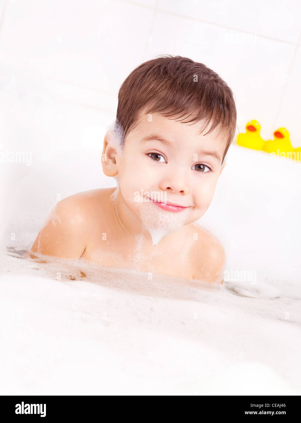 happy little boy taking a bath with foam Stock Photo - Alamy