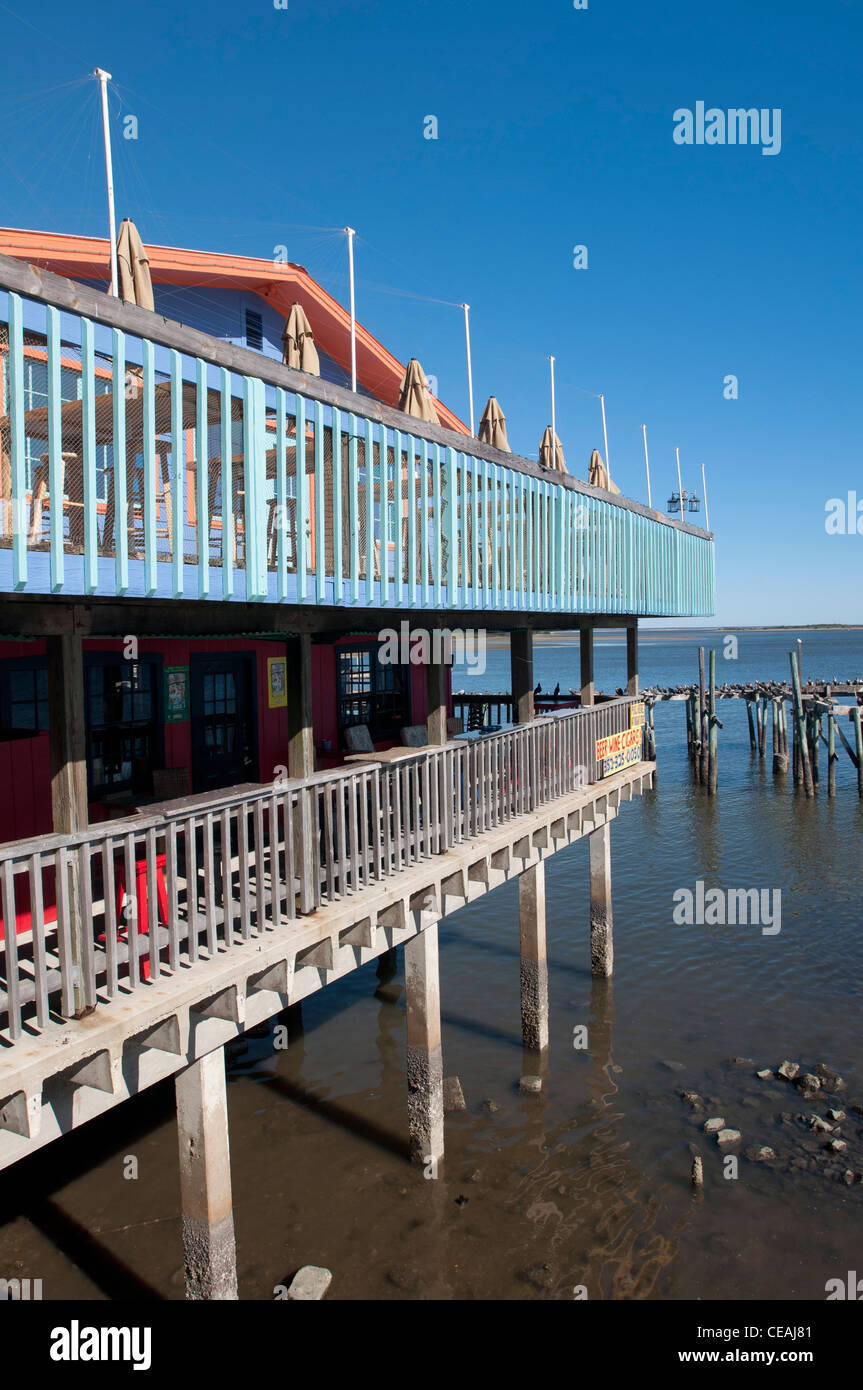 Waterfront buildings on stilts in Cedar Key tourist town, Gulf of Mexico, Florida, United States, USA Stock Photo