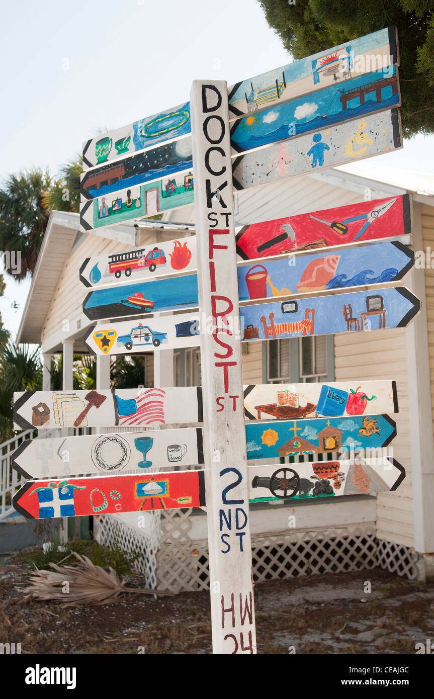 Tourist attraction sign painted by children,  2nd Street, Cedar, Key, Florida, United States, USA Stock Photo