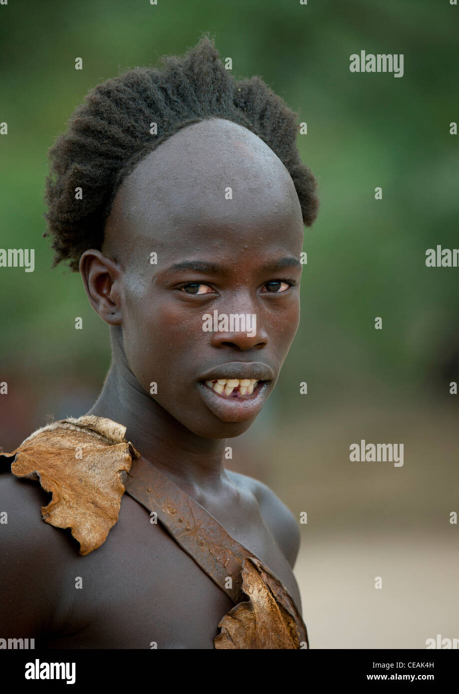 Portrait Of Bull Jumper Hamer Boy With A Mane Like Hairstyle Portrait Omo  Valley Ethiopia Stock Photo - Alamy