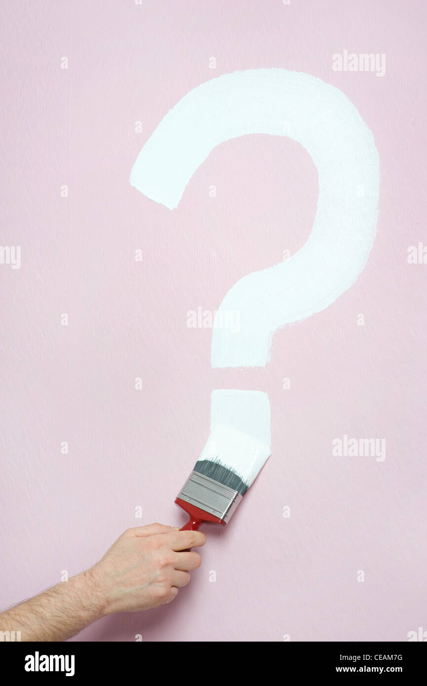 person paints a question mark Stock Photo