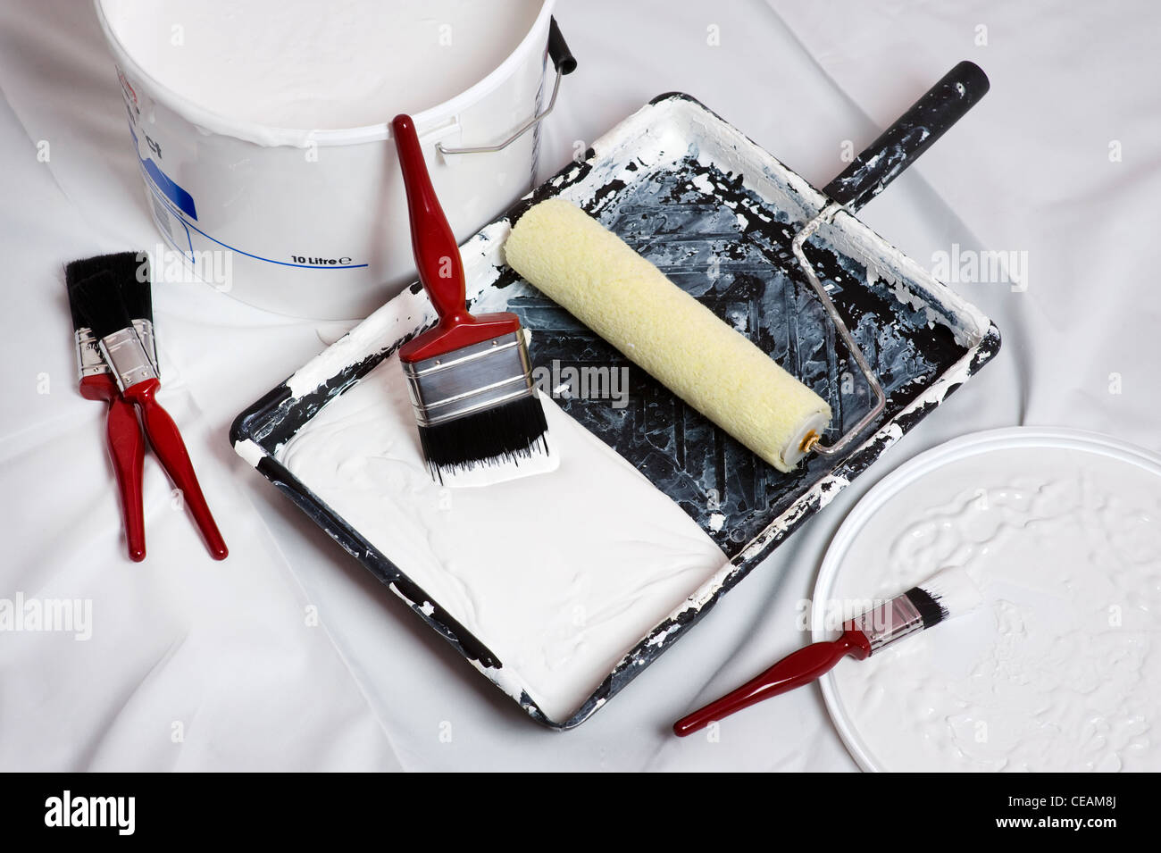 paint brushes and roller of a home decorator Stock Photo