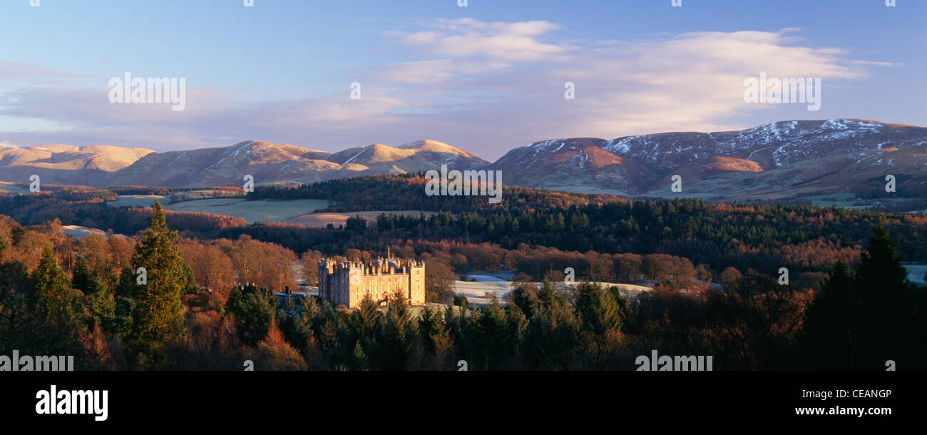 Sunrise winter snow on the Lowther Hills behind Drumlanrig Castle in scenic landscape of the Nith Valley, Nithsdale, Scotland UK Stock Photo