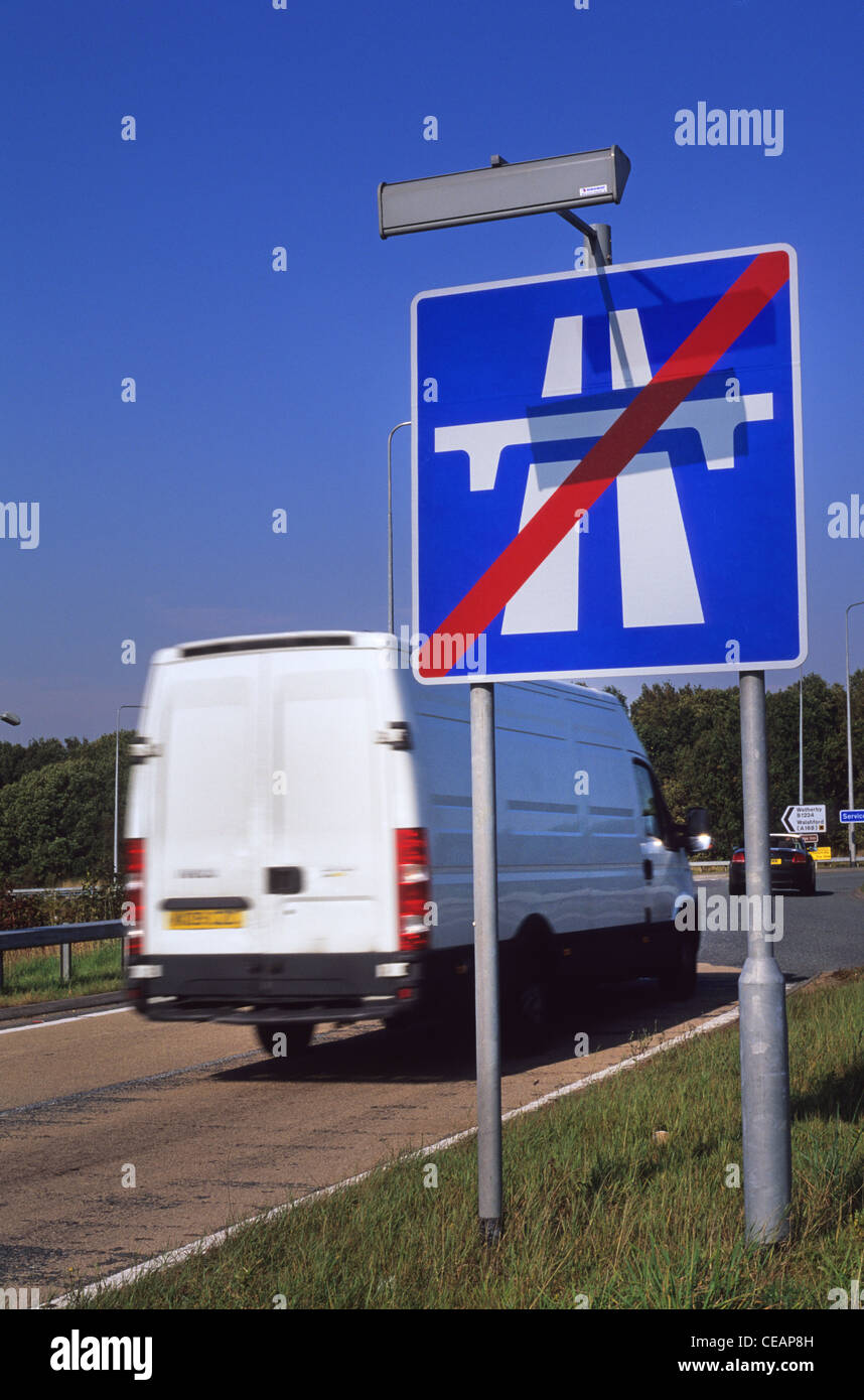 van passing end of motorway warning sign on A1/M motorway slip road near leeds yorkshire uk Stock Photo