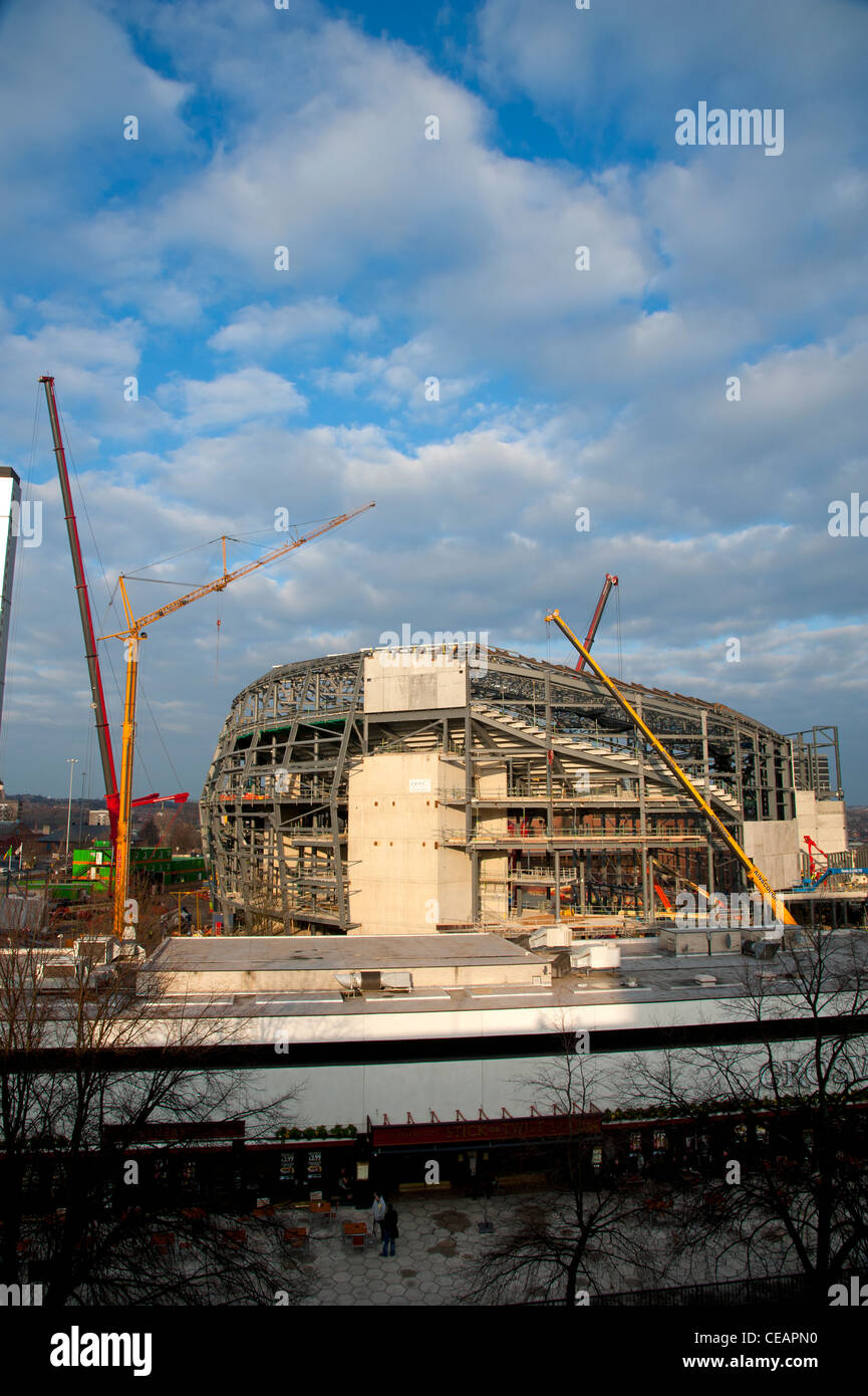 giant cranes working on construction of the Leeds Arena Yorkshire UK Stock Photo