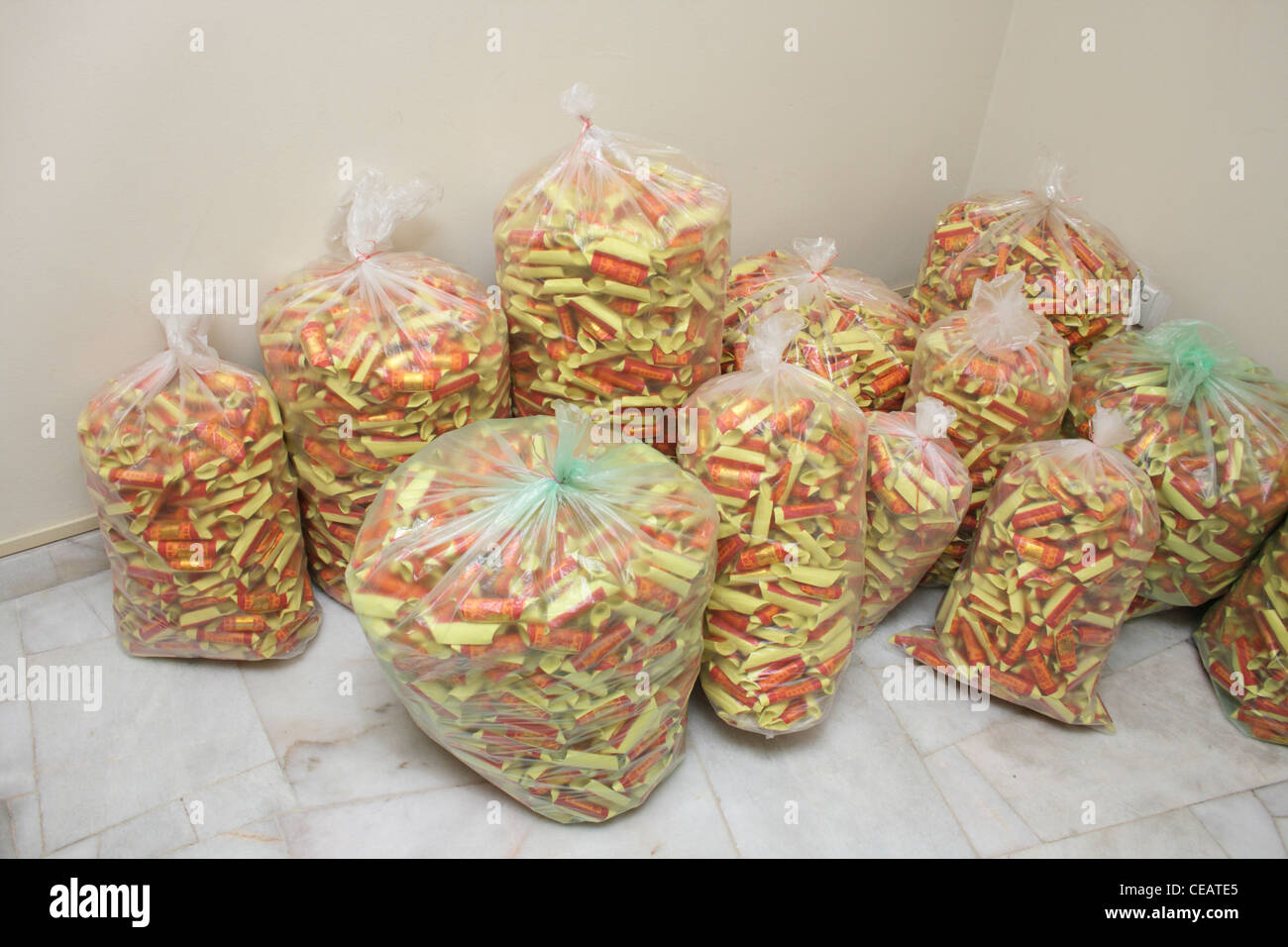 bags of joss paper for burning during Chinese funerals or as offering Stock Photo
