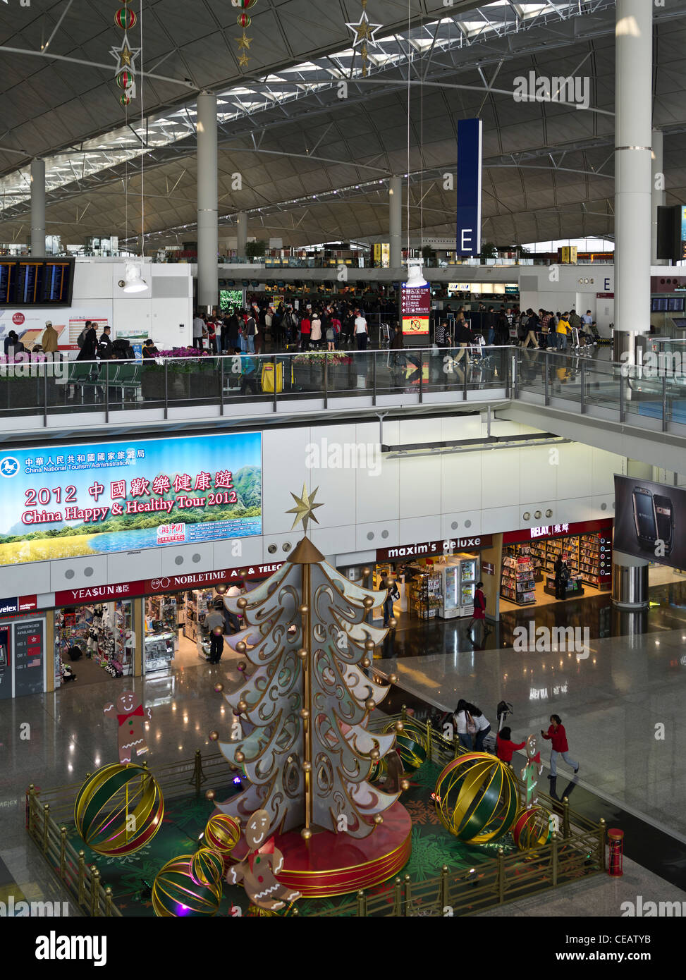 dh Hong Kong Airport CHEK LAP KOK HONG KONG Hong Kong International Airport Terminal 1 departures Christmas china hall interiors people Stock Photo