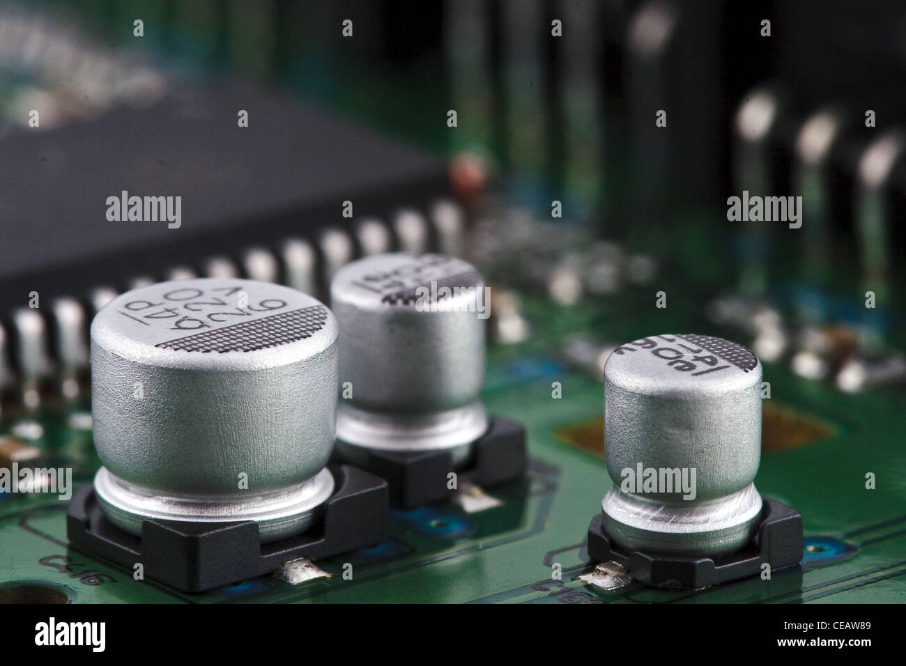 Capacitors on circuit board Stock Photo