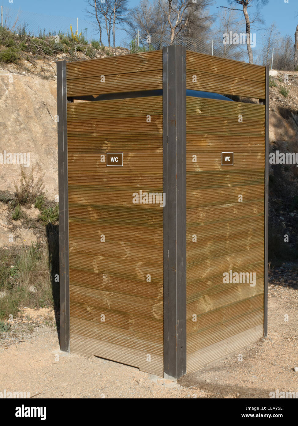 Portable, temporary individual toilet booth labelled "WC" as they are