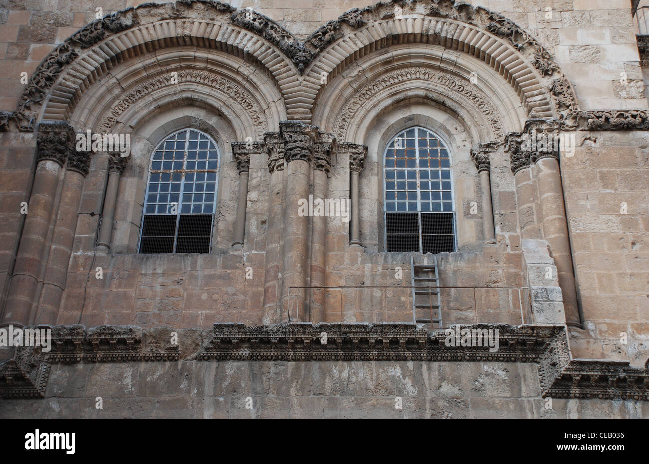 Ladder on window ledge leading to window in the Church of the holy sepulcher Stock Photo