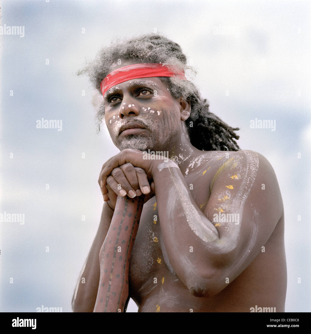 Aboriginal man playing a didgeridoo on a beach Stock Photo Alamy