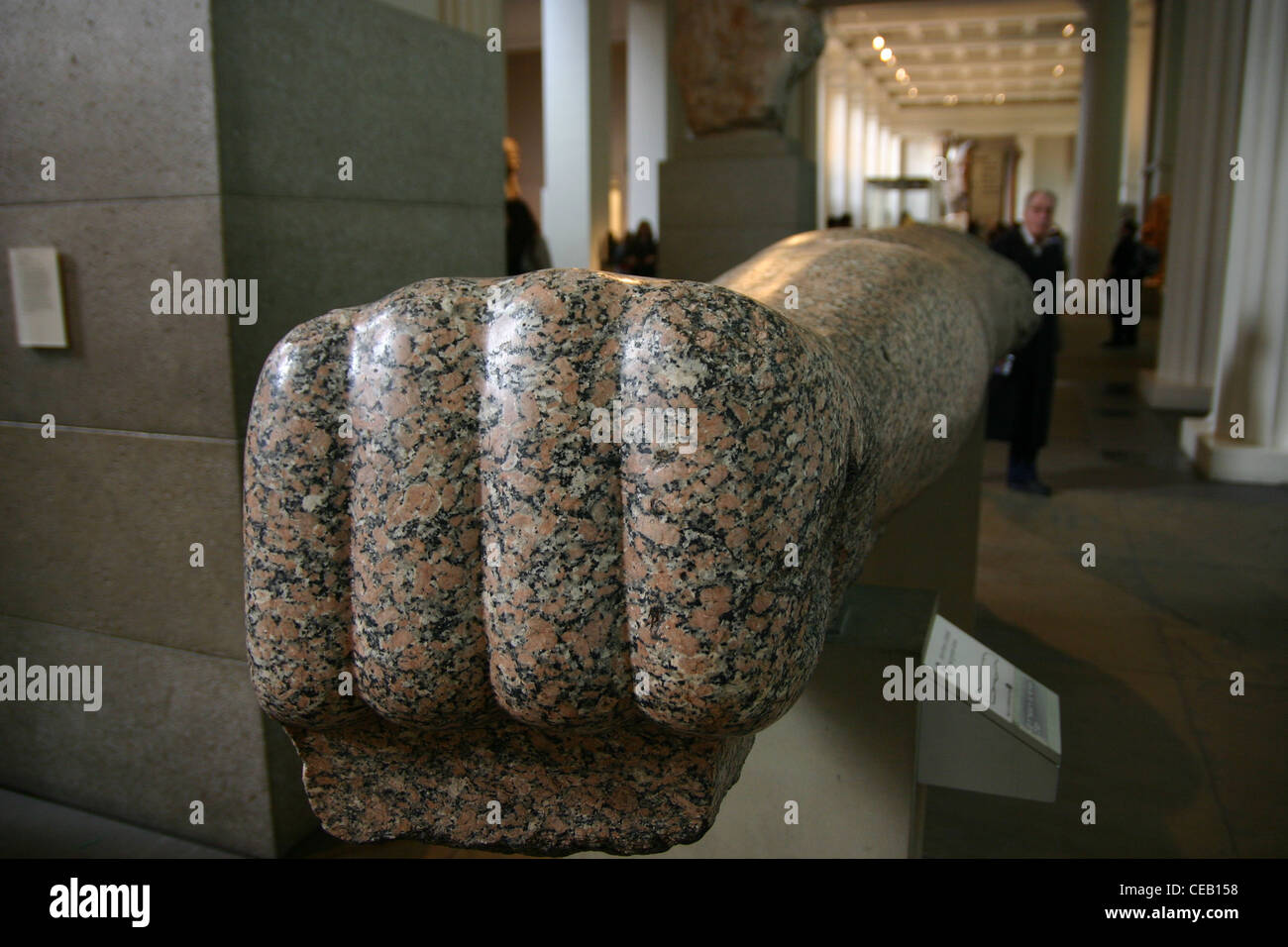 Left arm from monumental red granite statue of Amenhotep III in the British museum in London Stock Photo