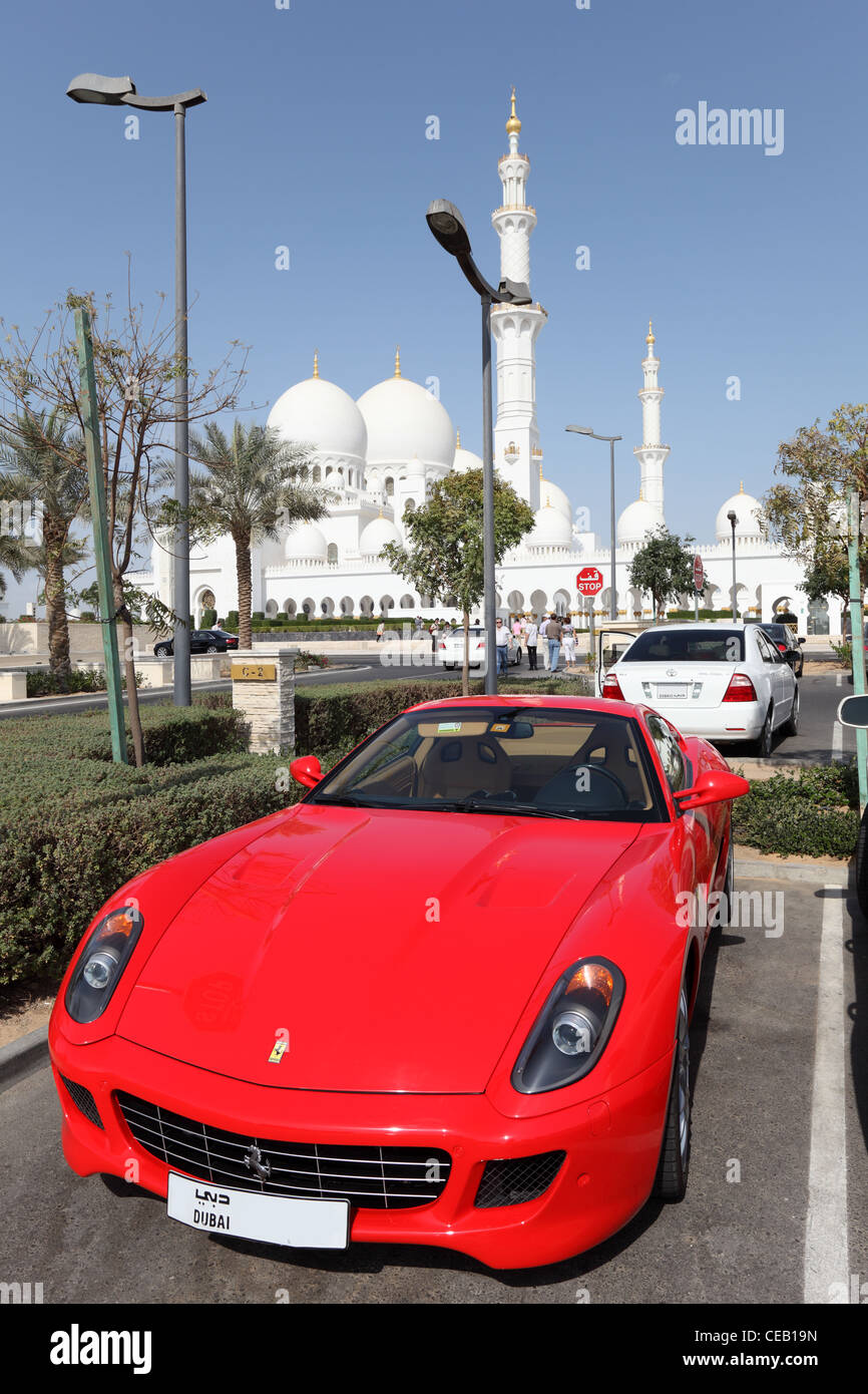 Luxury sportscar parked at the Sheikh Zayed Mosque in Abu Dhabi, United Arab Emirates Stock Photo