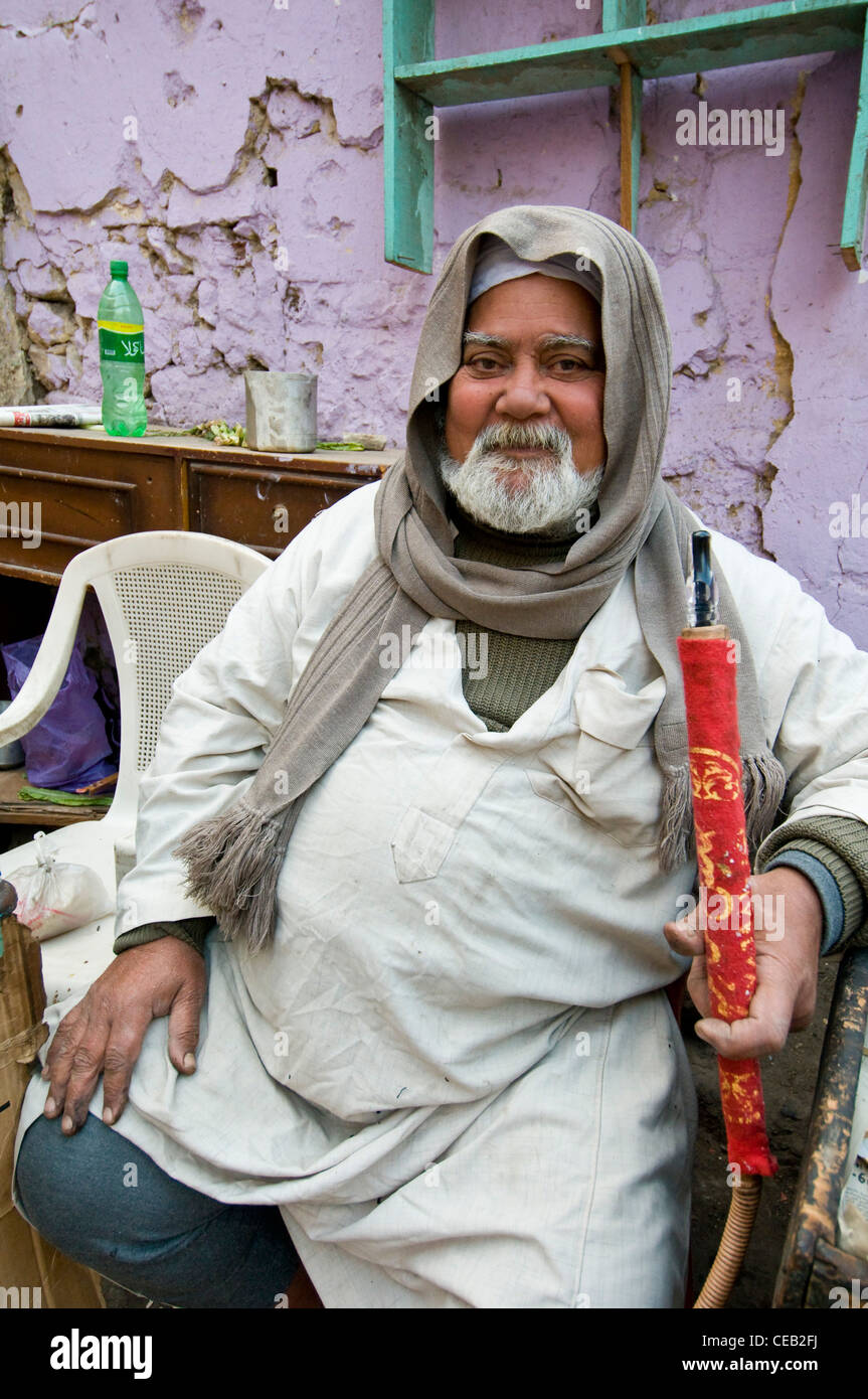 Man smoking water pipe downtown Cairo Egypt Stock Photo Alamy