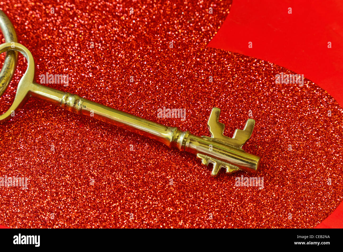 Brass key, red heart Stock Photo