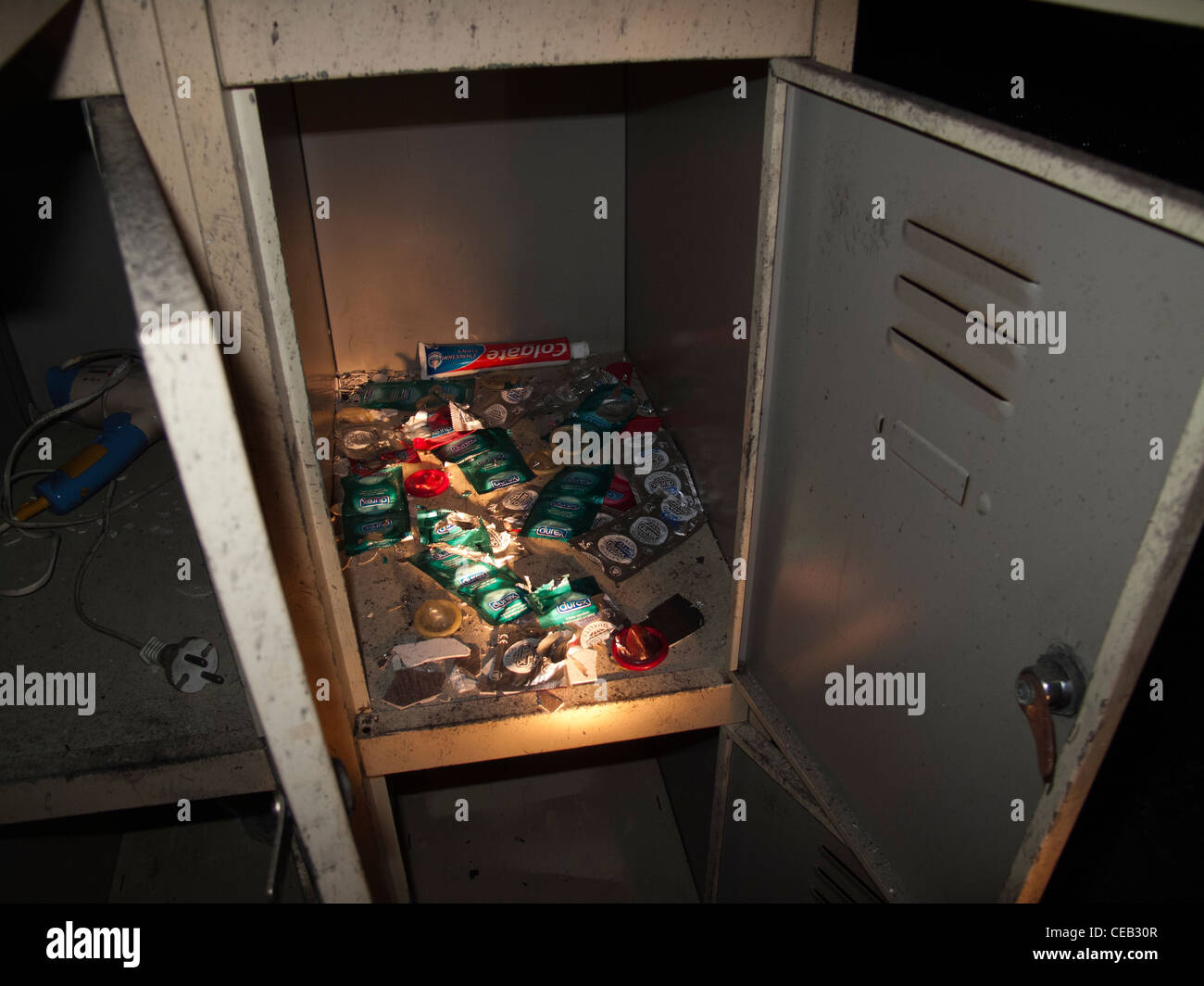 Opened up broken locker in abandoned brothel house, Spain Stock Photo