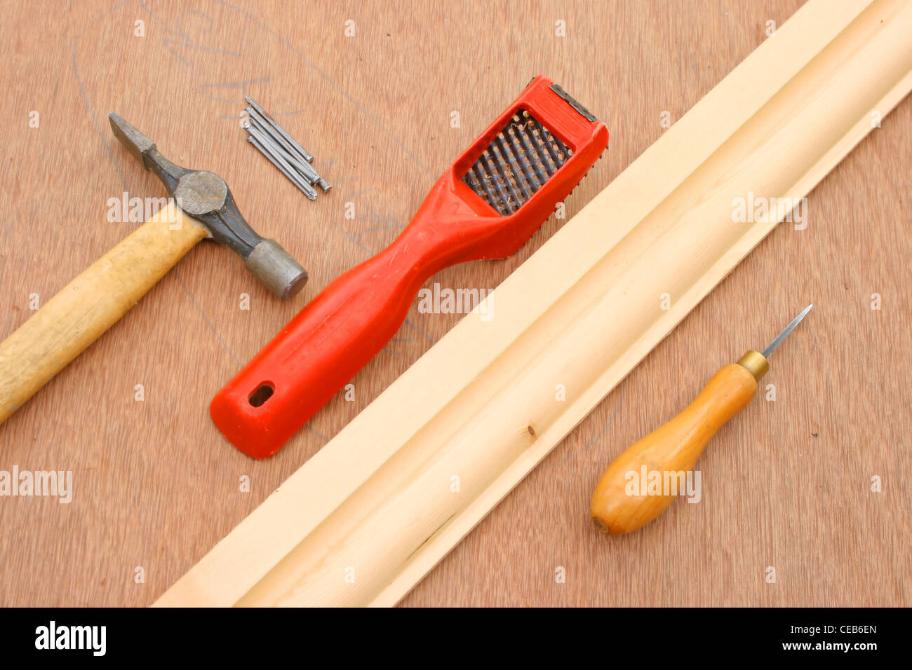 Carpentry hand tools with a length of timber. Stock Photo