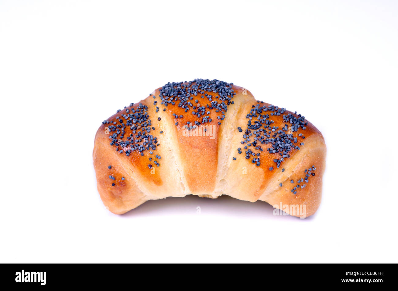 croissant with poppy seeds isolated on a white background Stock Photo
