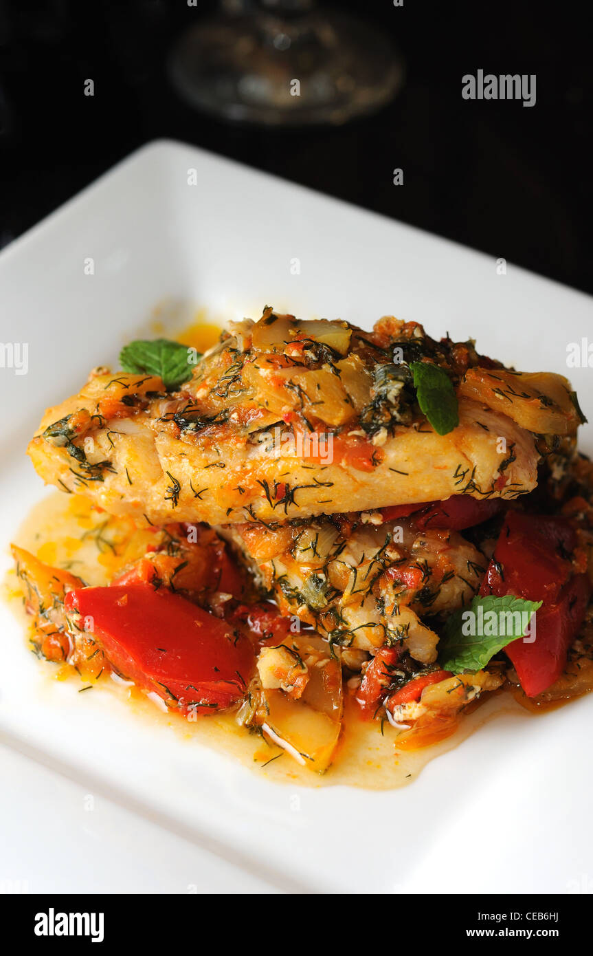 Braised filletted fish with vegetables Stock Photo Alamy