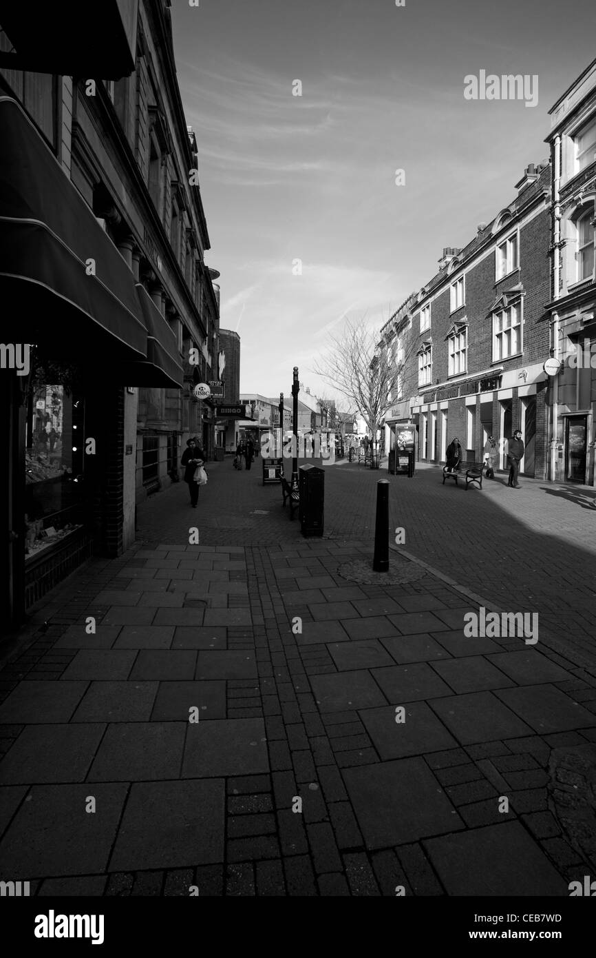 View down High Street in Kettering town centre towards Gold Street, Northamptonshire Stock Photo
