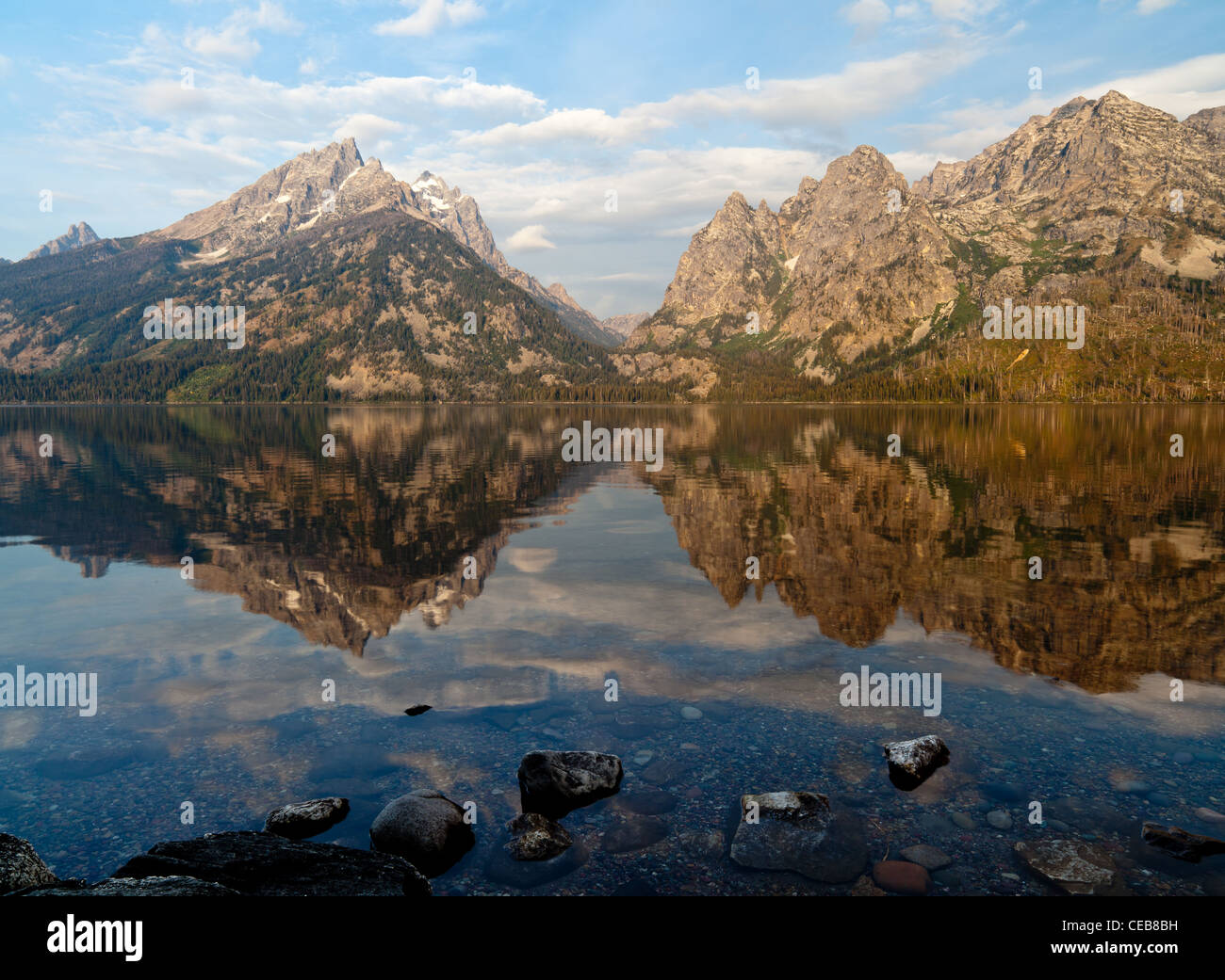 Jenny Lake in the Grand Teton National Park was formed approximately 12,000 years ago by glacial movement.  The lake is estimated to be well over 400 ft. deep and is over 1100 acres in size.   It is one of the major attractions in the park and has many activities both around it and nearby.  Interestingly in today's world, there was a study done in 2005 which indicated Jenny Lake's waters have not been harmed by air or water pollution. Stock Photo