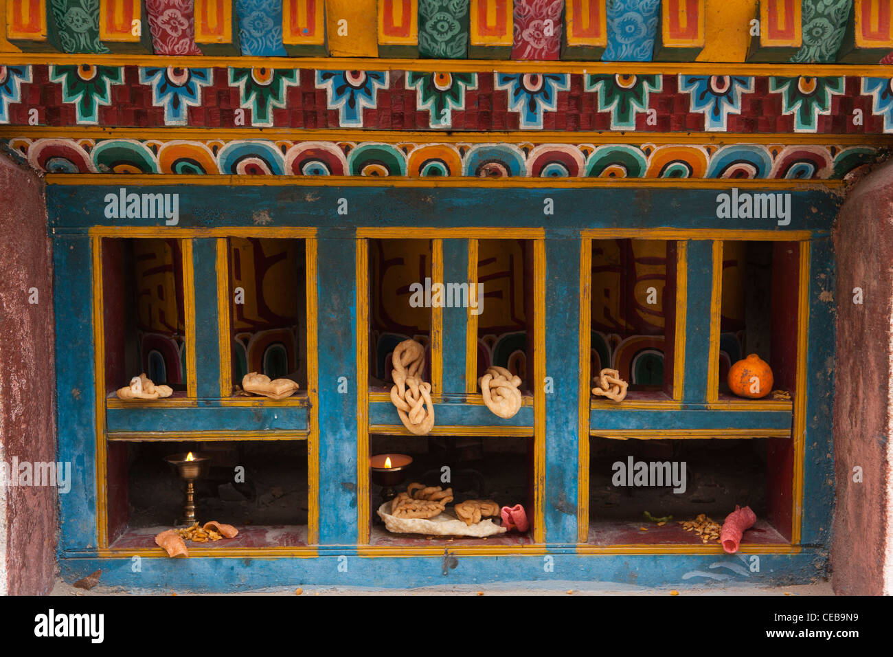 India, Arunachal Pradesh, Dirang, Losar Tibetan New Year Festival Tab Zan bread on prayer wheel Stock Photo