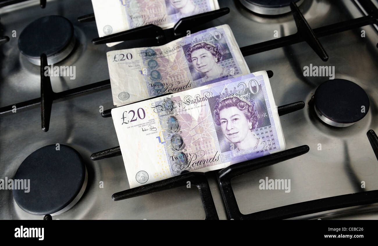 gas hob with english 20 pound note england uk Stock Photo