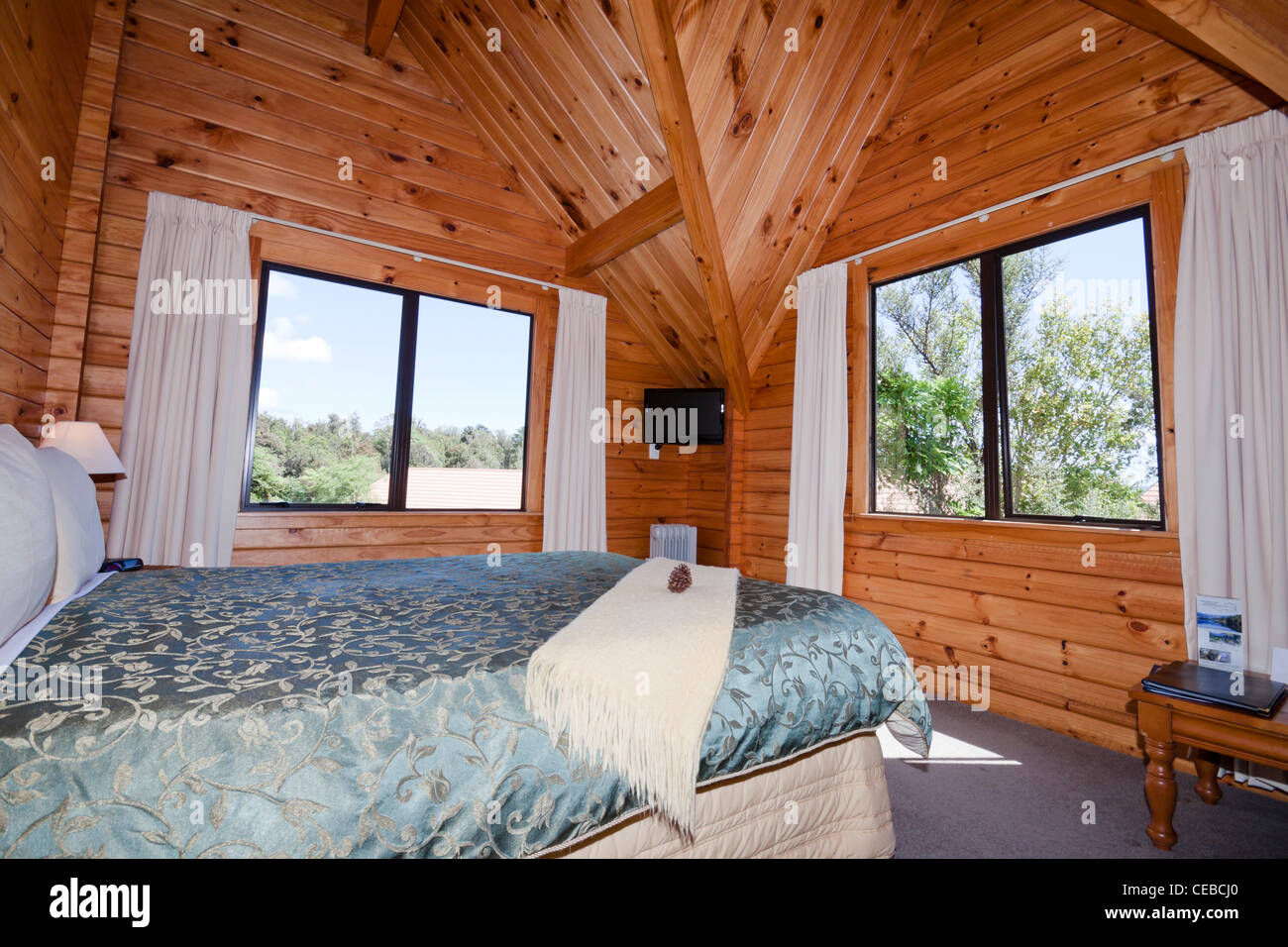 Nice warm interior of mountain wooden lodge apartment. Fox Glacier